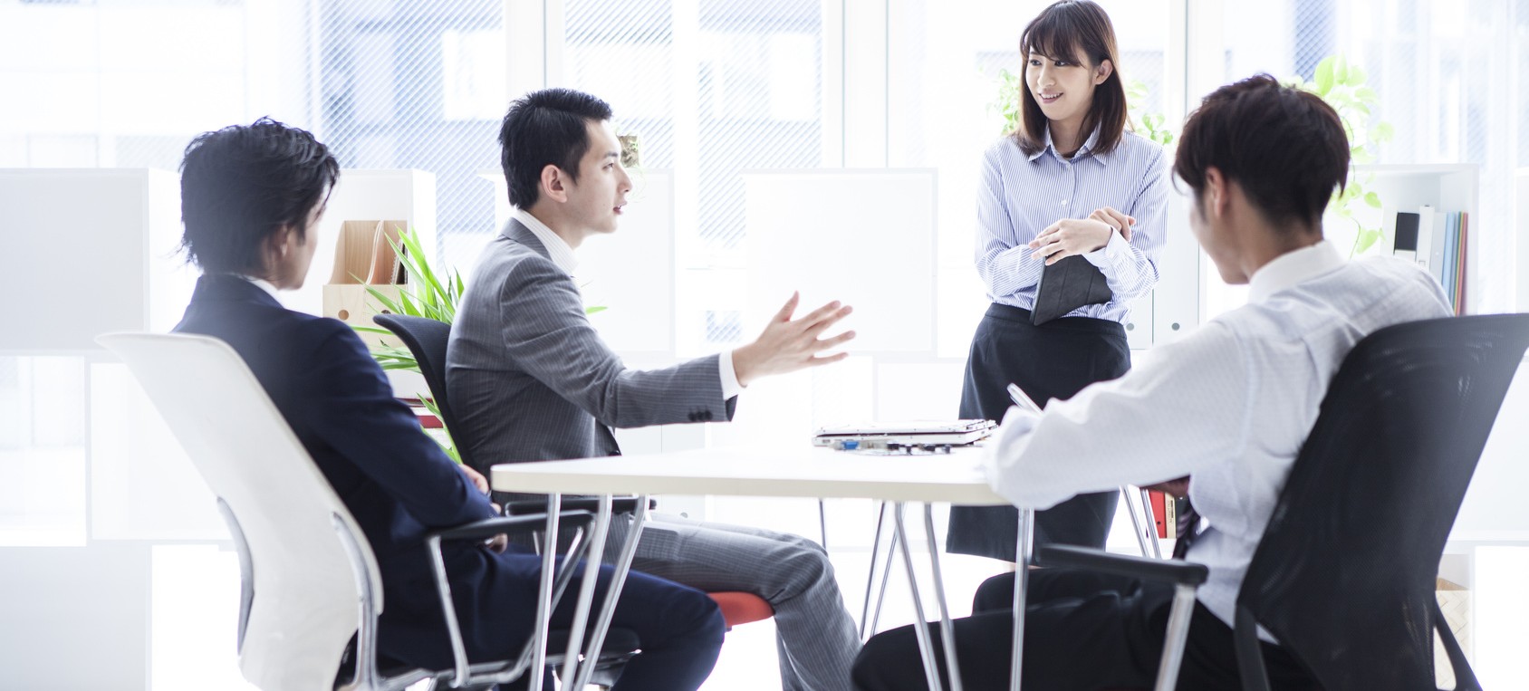 Business people are meeting in a bright office